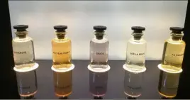  ??  ?? Les cinq parfums de la collection homme de Louis Vuitton sont : L’immensité, Nouveau monde, Orage, Sur la route et Au hasard.