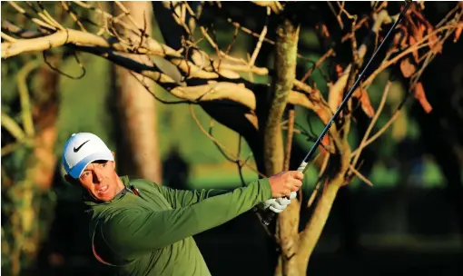  ?? GETTY ?? Rory McIlroy plays from the rough on the 10th hole during the second round at the Arnold Palmer Invitation­al