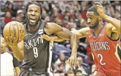  ?? PHOTO BY GETTY ?? Nothing comes easy in Big Easy for DeMarre Carroll and Nets on Wednesday in loss to Pelicans.