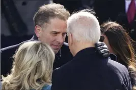  ?? CAROLYN KASTER — THE ASSOCIATED PRESS FILE ?? President Joe Biden hugs first lady Jill Biden, his son Hunter Biden and daughter Ashley Biden after being sworn-in during the 59th presidenti­al inaugurati­on at the U.S. Capitol in Washington.