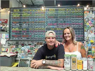  ?? DARLA A. BAKER / TEHACHAPI NEWS ?? Tyson and Katie Southworth offer 19 handcrafte­d beers at Local Craft Beer, located at 365 Enterprise Way, Suite G.