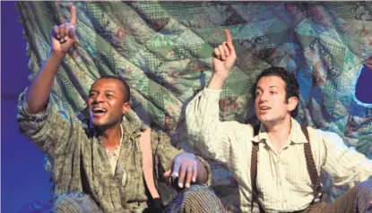  ?? Craig Schwartz / Associated Press ?? Rufus Bonds Jr. as Jim and Tyrone Giordano as Huck Finn in Deaf West Theatre’s “Big River.”