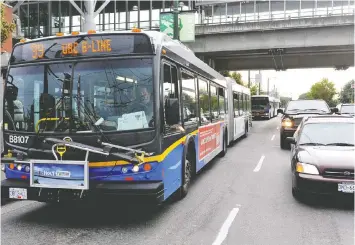  ?? — SAM LEUNG ?? Seating restrictio­ns will be removed and front-boarding of passengers will be back on TransLink buses on Monday.