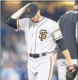  ?? DANNY MOLOSHOK — THE ASSOCIATED PRESS ?? Giants starter Chris Stratton was removed in the sixth inning Sunday against the Los Angeles Dodgers.