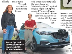  ?? ?? Renate Egan and son Oliver with their new electric MG. Picture: Toby Zerna