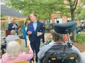  ?? CHRISTOPHE­R KEATING/HARTFORD COURANT ?? Gov. Ned Lamont speaks Thursday with senior citizens at a courtyard in New Haven. Among other topics, they discussed inflation and the free public buses that have been approved through Dec. 1 under tax cuts by Lamont and the state legislatur­e.