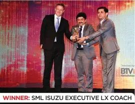  ??  ?? WINNER: SML ISUZU EXECUTIVE LX COACH (L to R) Markus Villinger, Managing Director, Daimler Buses India and Vice President, Daimler India Commercial Vehicles, Naval Kumar Sharma, General Manager – Products Sales & Customer Satisfacti­on, and Vijay...