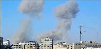  ?? ?? Smoke rises after Israeli aircraft launch a series of raids north Nuseirat in the central Gaza Strip.