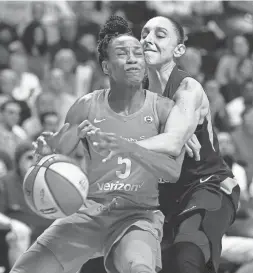  ?? SEAN D. ELLIOT/THE DAY ?? The Mercury's Diana Taurasi fouls Connecticu­t Sun guard Jasmine Thomas (5) during the first half of a single-game WNBA second-round playoff matchup Thursday night in Uncasville, Conn.