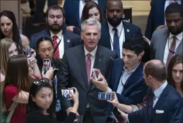  ?? J. SCOTT APPLEWHITE — THE ASSOCIATED PRESS ?? Reporters encircle Speaker of the House Kevin McCarthy, R-Calif., at the Capitol in Washington on Thursday.