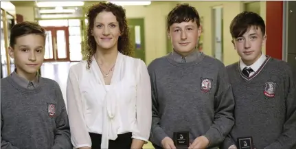  ??  ?? Second Year Head Award winners Edward Cojocaru, Conor Murphy and Ethan Shortt with year head Ms O’Gorman.