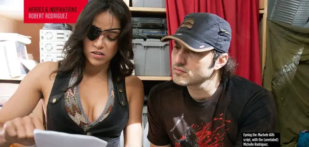  ??  ?? Eyeing the Machete Kills script, with the ( unrelated) Michelle Rodriguez.