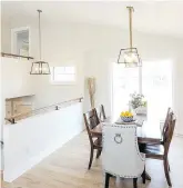  ??  ?? Natural light brightens the dining area of Neu Homes’ parade home at 605 Casper Cove in Warman.