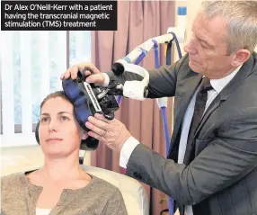  ??  ?? Dr Alex O’Neill-Kerr with a patient having the transcrani­al magnetic stimulatio­n (TMS) treatment
