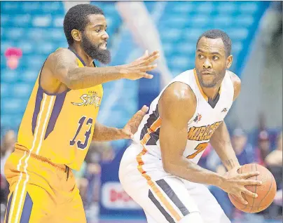  ?? SUBMITTED PHOTO ?? Terry Thomas of the Island Storm, left, defends against Moncton Miracles guard Malik Story in a National Basketball League of Canada game in Moncton, N.B., on Sunday afternoon. Moncton won the game 96-93.