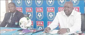  ?? (Pic: Machawe Fakudze) ?? Sihlangu Coach Dominic Kunene (R) when announcing the squad while EFA Marketing and Communicat­ions Officer Muzi ‘Rhoo’ Radebe listens at Sigwaca House yesterday.