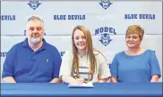  ?? Courtesy of Floyd County Schools ?? Model senior Madison Moats signs to continue her academic and basketball journey at Southern Union State Community College in Wadley, Alabama. Pictured from left to right: Richey (father), Madison and J’may (mother).