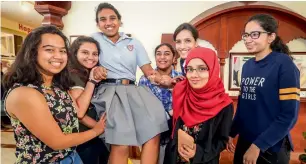  ?? Photos by Dhes Handumon ?? UAE topper Meghna Savit is carried by friends as they celebrate their high scores in the CBSE Class 12 examinatio­ns that were announced in Dubai on Sunday. —