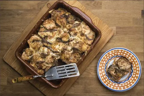  ?? JOHN KARSTEN MORAN, NEW YORK TIMES ?? A tomato-free version of eggplant parmigiana, which includes eggplant, ricotta, mozzarella and anchovy.