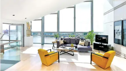  ??  ?? Sweeping views: The living room of the £10,000-a-month three-bedroom penthouse rented by Becker