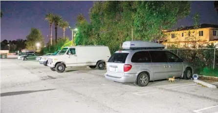  ?? — AFP ?? Cars with sleeping veterans in a parking lot near the Veteran’s Affairs Los Angeles Healthcare Centre.