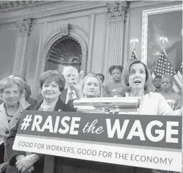  ?? J. SCOTT APPLEWHITE/AP ?? U.S. Rep. Lois Frankel, second from left, a Palm Beach County Democrat, joins House Speaker Nancy Pelosi on July 18, 2019, in support of increasing the federal minimum wage to $15 an hour. Florida voters will vote on a referendum question in the 2020 presidenti­al election that would increase the $8.56-an-hour Florida minimum wage to $15 over six years.