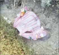  ??  ?? FRAGILE: A baby’s discarded life jacket tells its own story.