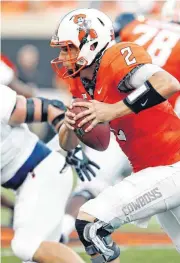  ?? [PHOTO BY NATE BILLINGS, THE OKLAHOMAN] ?? Oklahoma State’s Mason Rudolph carries the ball in the second quarter Thursday at Boone Pickens Stadium in Stillwater.