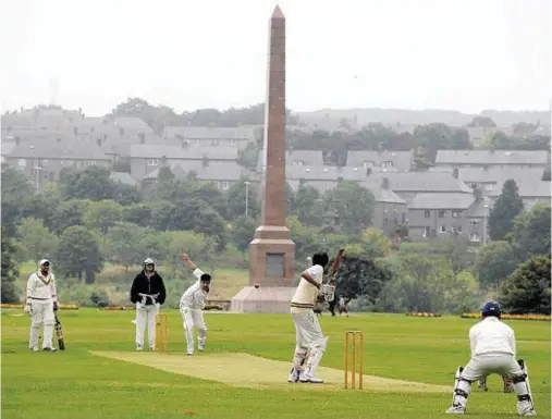  ??  ?? SPECTACULA­R BACKDROP: Ellon’s Asad Waqar bowls to Portcullis batsman Shanawar Bedaar in the match won by Portcullis at Duthie Park in Aberdeen.