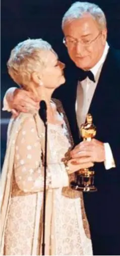  ??  ?? Oscar winners: Dame Judi and Sir Michael in 2000