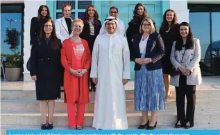  ?? ?? A group photo of Gulf Bank leaders and employees with the guests after the panel discussion.