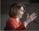  ?? AP PHOTO/J. SCOTT APPLEWHITE ?? House Minority Leader Nancy Pelosi, D-Calif., talks to reporters during a news conference at the Capitol in Washington on Thursday.