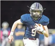  ?? / Steven Eckhoff ?? Unity Christian’s Samuel Mumpower runs down the field on the way to a touchdown during the first half Friday.