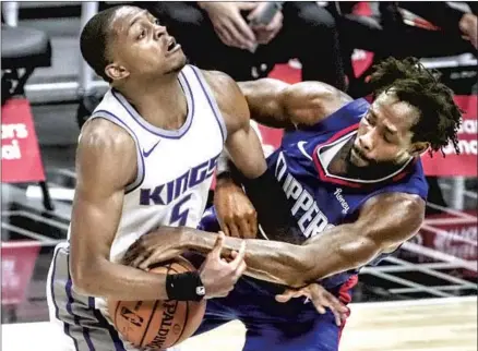  ?? Robert Gauthier Los Angeles Times ?? THE CLIPPERS’ Patrick Beverley, right, has been a huge presence defensivel­y, but he has missed 10 of the team’s first 38 games.