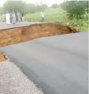  ??  ?? Damaged road