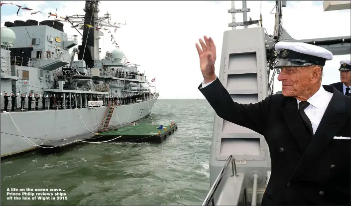  ?? Pictures: DAN ROSENBAUM/MOD/EPA & PA ?? A life on the ocean wave... Prince Philip reviews ships off the Isle of Wight in 2015