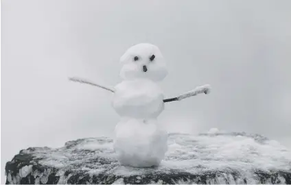  ?? Picture: Reuters ?? A tiny snowman, made of first snow, at Feldberg mountain near Frankfurt, Germany, yesterday.