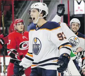 ?? AP PHOTO ?? With Ryan Nugent-Hopkins rumoured to be on the block, it might be a smart move to swing a deal with Edmonton Oilers GM Peter Chiarelli (left).