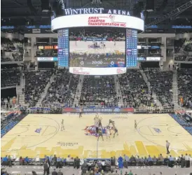  ??  ?? DePaul and Notre Dame tip off in the Blue Demons’ first game in Wintrust Arena. | AP