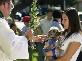  ?? MIKE MULLEN — WCTY ?? First Congregati­onal Church of San Rafael presents a blessing of the animals on Sunday.