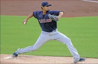  ?? Gene J. Puskar / Associated Press ?? Pitcher Carlos Carrasco overcame leukemia to become one of the American League’s steadiest starters. Now, he’s been traded to the New York Mets.