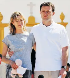  ??  ?? Kate and Gerry attend a mass in Praia da Luz days after their daughter disappeare­d