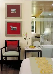  ??  ?? mostly translates to complex, multi-hued environmen­ts rich with pattern. For those who want a more neutral and contempora­ry approach, showcase singular Indian design elements such as the targeted use of ruby red in artwork and a throw pillow shown here at the Oberoi Mumbai.