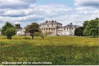  ?? ?? Shugboroug­h Hall with its colourful meadow