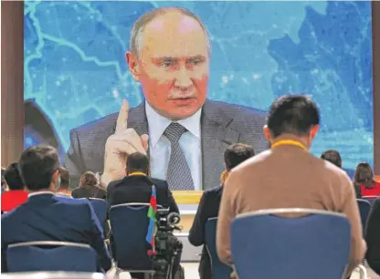  ?? ALEXANDER ZEMLIANICH­ENKO/ AP ?? Russian President Vladimir Putin speaks via video call during a news conference in Moscow on Thursday.