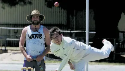  ??  ?? Western Park’s Sam Laffy bowled without luck in division three, with his teammates helping to restrict Iona to 152; Photograph­s: Paul Cohen.