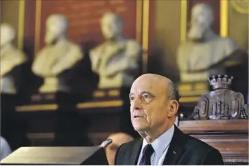  ?? Georges Gobet AFP/Getty Images ?? “I WILL NOT be a candidate in the election,” veteran conservati­ve French politician Alain Juppe told journalist­s, after party officials had suggested that he could save them by running in place of Francois Fillon.