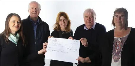  ??  ?? Presentati­on of €2,000 from Listerlin to New Ross Meals on Wheels. From left; Jackie Delahunty, Colm Caulfield, Meals on Wheels treasurer; Ann Maire Ryan, Dick Lyng, Meals on Wheels secretary and Delorus Doherty.