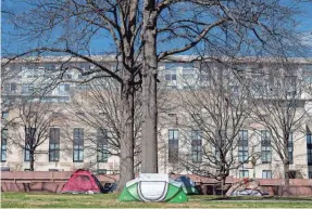  ?? MANDEL NGAN/AFP VIA GETTY IMAGES ?? Tents make up a homeless encampment in the Foggy Bottom neighborho­od of Washington, D.C., in 2022.