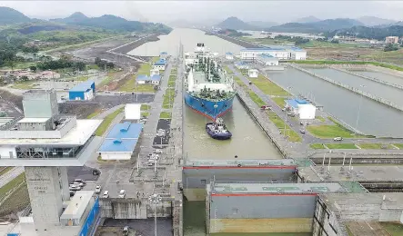  ?? PANAMA CANAL AUTHORITY ?? The Maran Gas Apollonia passes through the expanded Panama Canal Cocoli Locks, the first tanker of its size to do so.